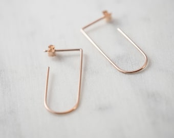 Minimalist open hoops in rose gold