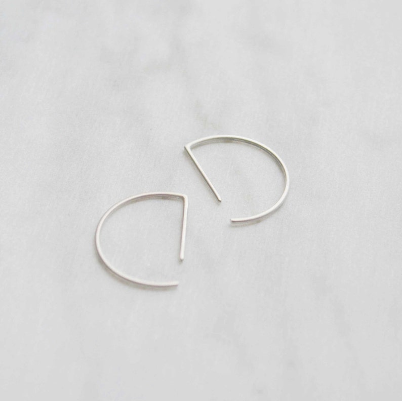 Dainty half circle earrings in silver image 2