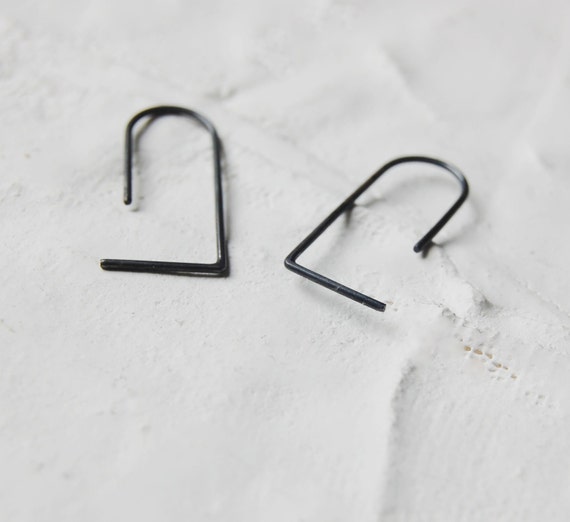 Staple earrings in silver. Edgy earrings