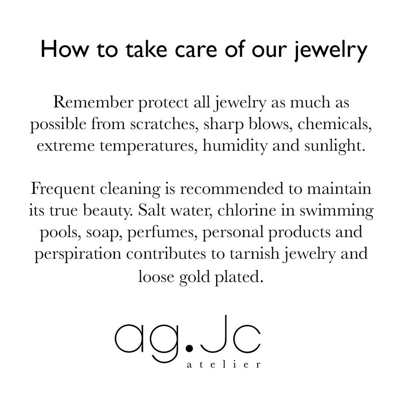 May include: Text-based image with instructions on how to take care of jewelry. The text reads: "How to take care of our jewelry. Remember protect all jewelry as much as possible from scratches, sharp blows, chemicals, extreme temperatures, humidity and sunlight. Frequent cleaning is recommended to maintain its true beauty. Salt water, chlorine in swimming pools, soap, perfumes, personal products and perspiration contributes to tarnish jewelry and loose gold plated. ag.Jc atelier."