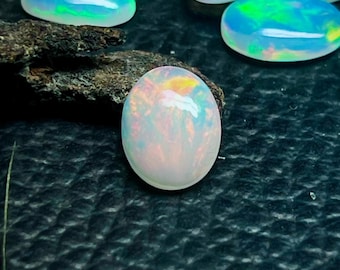 Ethiopian Opal Cabochon: 2.25 Carat Oval Gemstone, Multi-Fire