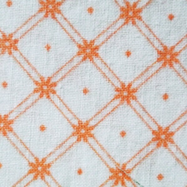 Vintage 1960s quilt fabric in highquality prewashed unused cotton with orange quadratic pattern on white bottomcolor
