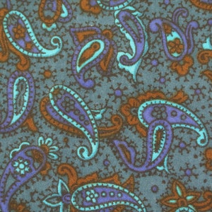 Vintage 1940s quilt fabric in highquality unused cotton with smaller printed paisley pattern on dark petrol blue bottomcolor