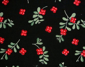 Vintage 1970s quilting sewing fabric in unused cotton with red/ green larger printed berries motive on black bottomcolor