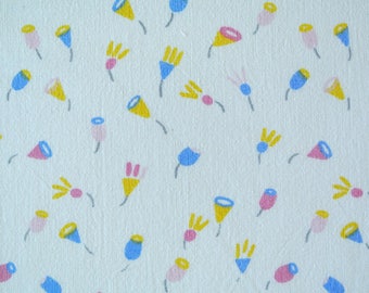 Vintage 1970s quilt fabric in prewashed cotton with small printed light pastel pattern on bone white bottomcolor