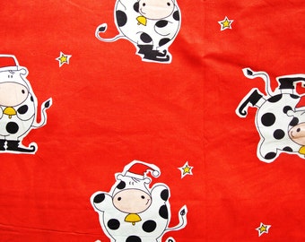 Vintage 1980s fabric in highquality unused cotton/ synthetic with X-LARGE printed black/ white Christmas cow pattern on red bottomcolor