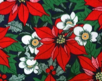 Vintage 1980s fabric in highquality unused cotton with larger green/ red/ white printed Christmas rose flower motives on darkblue bottom