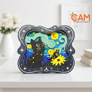 May include: A multi-layered wooden shadow box art piece featuring a black cat with yellow star accents, a yellow butterfly, and a bright yellow sunflower. The background displays a swirling blue night sky with yellow stars and a crescent moon.