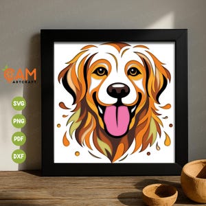 May include: A framed art print featuring a colorful illustration of a dog's face. The artwork uses shades of orange, yellow, and brown, with a pink tongue. The frame is black, and the image is on a white background. The image also includes the text "CAM ARTCRAFT" and file type icons.