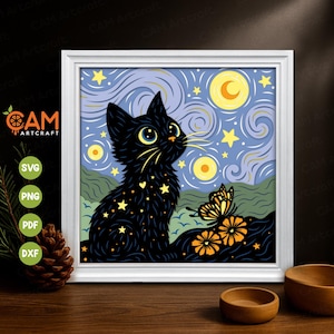 May include: A framed art print featuring a black cat with yellow eyes, gazing at a butterfly. The artwork has a starry night sky background with yellow stars and a crescent moon. The print is in a white frame.