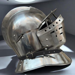 May include: A polished steel medieval knight's helmet with a visor and a leather strap. The helmet has a rounded top and a hinged visor with small rectangular openings. The text "MEDIVAL KNIGHT" is visible in the upper left corner.