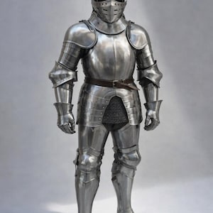 May include: Full suit of polished steel armor, including a helmet with a visor, chest and back plates, arm and leg protection, and gauntlets. A brown leather belt is worn at the waist. The image includes the text "MEDIVAL KNIGHT".