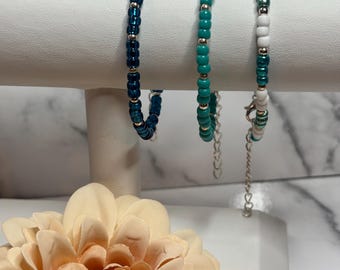 Handmade green dainty seed bead bracelets with a silver plated clasp