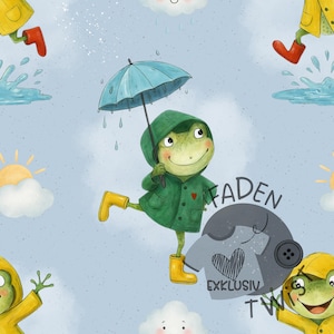 Könnte beinhalten: Eine skurrile Illustration zeigt einen Frosch in einem grünen Regenmantel und gelben Gummistiefeln, der einen blauen Regenschirm hält. Der Frosch ist in einer spielerischen Pose vor einem hellblauen Hintergrund mit Regen, Wolken und Sonnen dargestellt. Der Text "FADEN" und "EXKLUSIV" sind ebenfalls sichtbar.