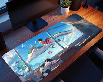 May include: A rectangular desk mat with a colourful anime illustration. It shows a girl riding a white dragon against a blue sky with clouds and a rainbow. A panda plushie is also visible. The mat is on a wooden desk.