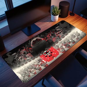 May include: A black and red gaming mouse pad featuring a stylized illustration of a video game scene. The design includes various characters and elements in shades of gray, red, and white, creating a detailed and thematic visual.