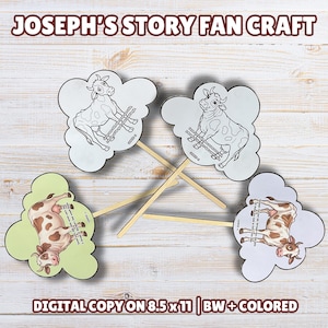 May include: Four cow-shaped fan crafts with wooden sticks. Two fans are black and white line drawings of a cow, and two are coloured. The text "JOSEPH'S STORY FAN CRAFT" is at the top. The text "DIGITAL COPY ON 8.5 x 11 | BW+COLORED" is at the bottom.