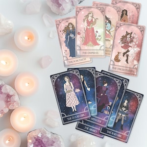 May include: A collection of tarot cards featuring illustrations of women in various poses and attire. The cards have a pink and purple color scheme with text labels such as "The Empress," "The Sorceress," and "The Good Girl." The image also includes lit candles and crystals.