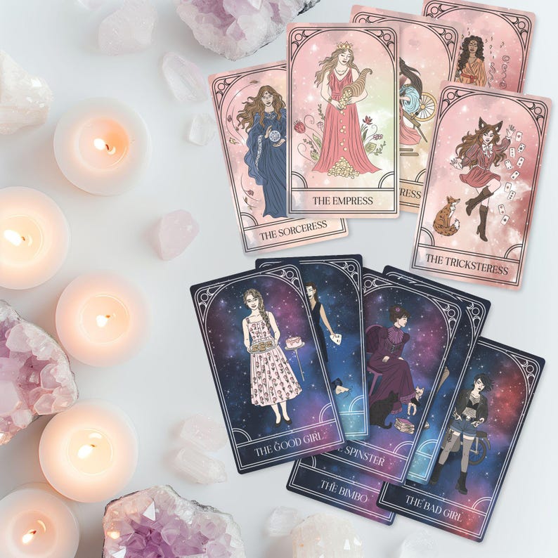 May include: A collection of tarot cards featuring illustrations of women in various poses and attire. The cards have a pink and purple color scheme with text labels such as "The Empress," "The Sorceress," and "The Good Girl." The image also includes lit candles and crystals.