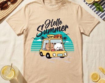 May include: Beige t-shirt with a "Hello Summer" graphic. The design features a yellow car with two cartoon bears, luggage, palm trees, and a turquoise and blue background. Sunglasses and a straw hat are visible.