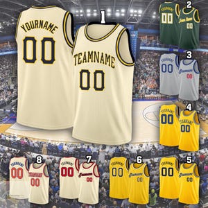 May include: A collection of sleeveless basketball jerseys in various colors including cream, green, grey, yellow, red, and white. Each jersey features the text YOURNAME or TEAMNAME and the number 00 in bold, contrasting block lettering.