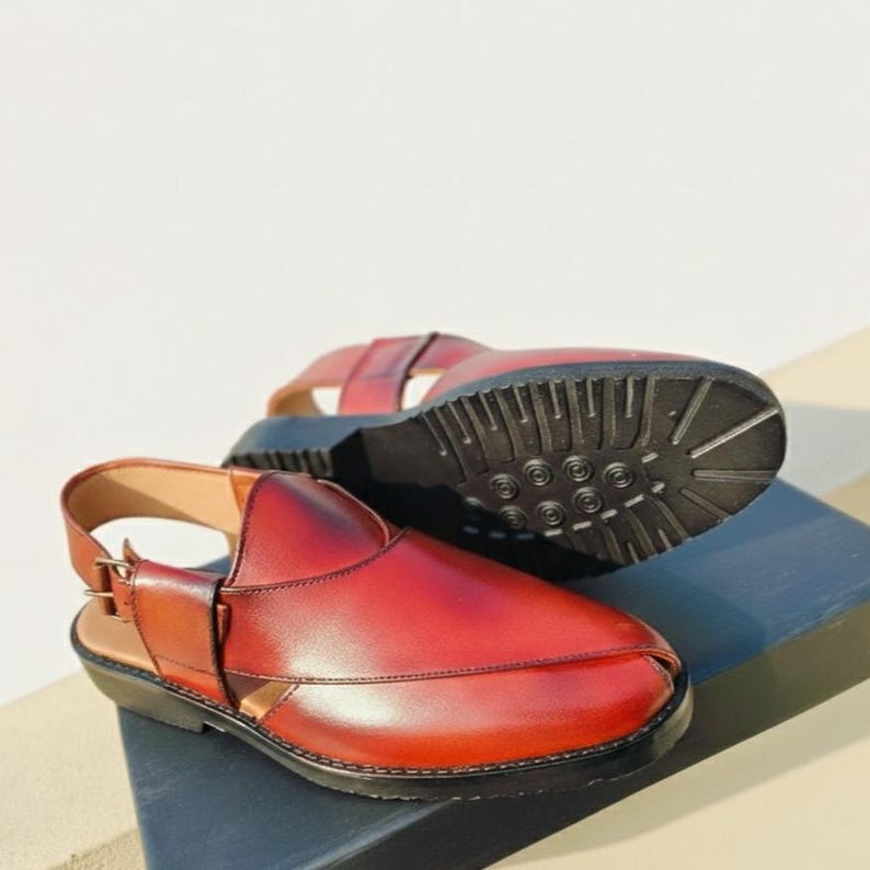 Artisan-crafted Chapli sandals with durable Vibram sole – angled side view