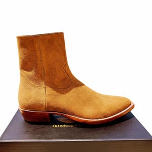 Handmade with care from camel suede