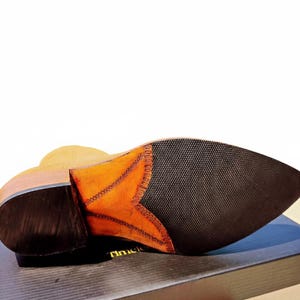 Comfortable rubber-padded sole for durability and grip