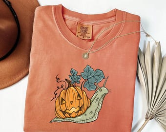 Comfort Colors Quirky Halloween T-Shirt, Pumpkin Snail Tee, Whimsical Fall Graphic Tee