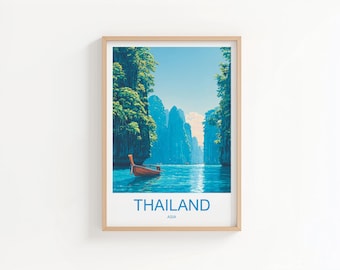 May include: Framed art print featuring a serene Thailand landscape. A small wooden boat floats on turquoise water, surrounded by lush green cliffs and towering rock formations. The sky is a clear blue. The word "THAILAND" is printed in blue.