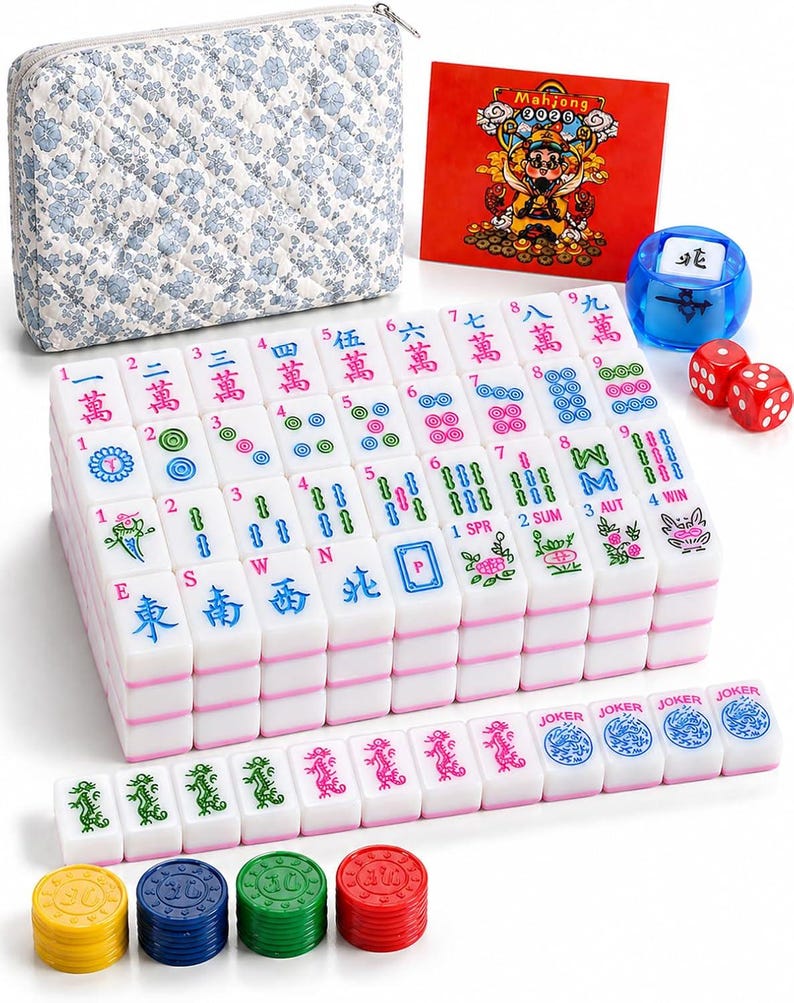 May include: A Mahjong set featuring white tiles with colorful Chinese characters, numbers, and symbols, a blue translucent wind indicator, two red dice, four stacks of colored plastic chips, a floral quilted carrying case, and a red instruction card.