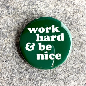 May include: A green button with white text that reads "work hard & be nice".