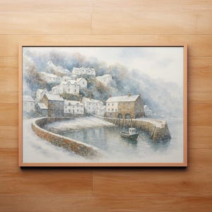 May include: Watercolor painting of a coastal village in a wooden frame. The artwork depicts white buildings nestled on a hillside overlooking a harbor. A stone pier curves into the water, with a small boat moored nearby. The scene is rendered in soft blues and grays.