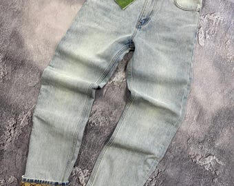 Gucci Light Blue Jeans with GG Logo Cuffs