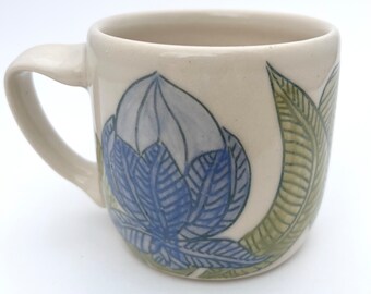 Mug with Blue Flower and Green Leaves