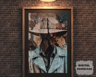 May include: Framed digital art print featuring a stylized portrait of a person wearing a cowboy hat and denim jacket. The artwork has a distressed, textured appearance with a cracked effect across the face. The print is displayed on a brick wall.