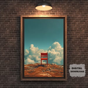 May include: A framed digital print featuring a vibrant red chair set against a backdrop of a blue sky and fluffy white clouds. The chair sits on a grassy, brown landscape. The frame is a dark wood color. The words "DIGITAL DOWNLOAD" are in the lower right corner.