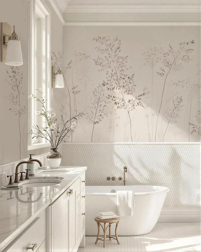 May include: A bright, airy bathroom with a white vanity, a freestanding tub, and a floral wallpaper. The room features a marble countertop, bronze fixtures, and a small wooden stool. The walls are painted in a neutral color.
