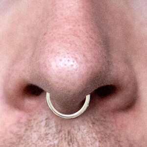 Nostril outlet piercing male