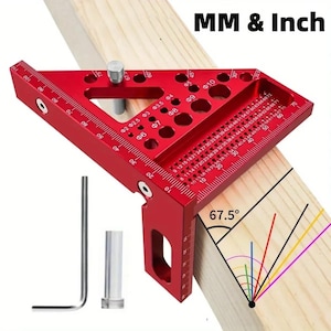 May include: A red aluminum angle square with measurements in inches and millimeters, used for woodworking. The tool is placed on a wooden plank, with an illustration of angles. Includes an Allen wrench and a cylindrical piece. Text reads "MM & Inch".