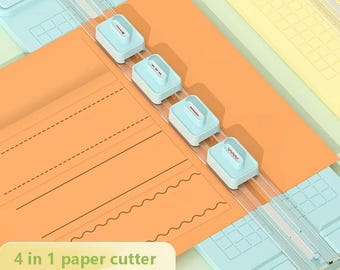Puede incluir: Un cortador de papel con una base azul claro y una guía de corte transparente. El papel naranja está siendo cortado por cuatro deslizadores blancos y azul claro. El texto de la imagen dice "4 in 1 paper cutter" y "cut A3/A4/B5/A5/A6".
