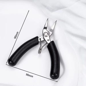 May include: A pair of silver metal pliers with black rubber handles, each measuring 90mm in length. The pliers have pointed tips and a spring mechanism. The tool is designed for precision work.