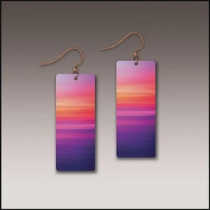 May include: A pair of rectangular earrings with a sunset design. The earrings feature a gradient of colors, including purple, pink, orange, and yellow. The ear wires are a gold color.