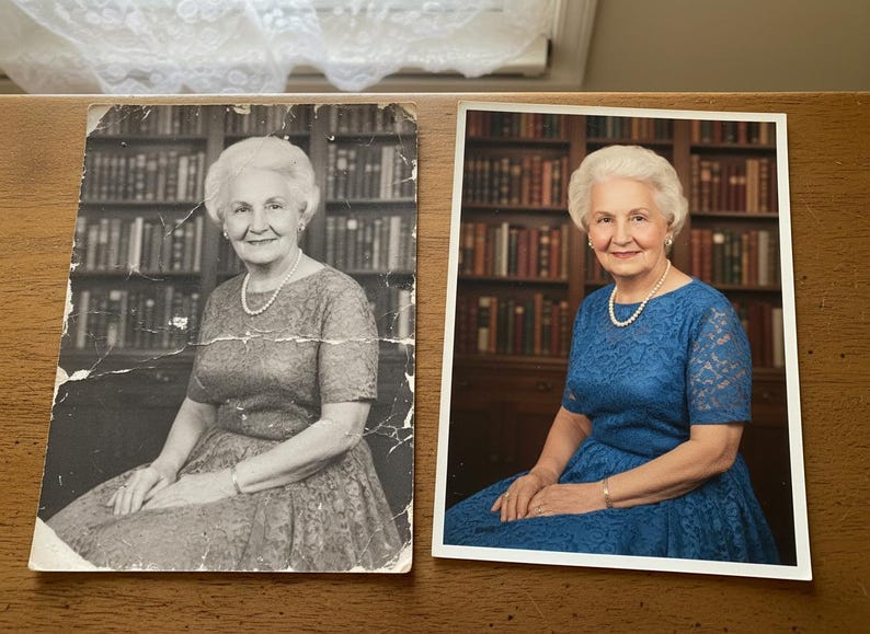 May include: Side-by-side portraits of a woman in a blue dress and a black and white version of the same photo. The woman has white hair and wears a pearl necklace and bracelet. A bookshelf is in the background.
