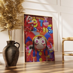 May include: A framed art print featuring a cartoon character with large eyes, wearing a jester-like outfit. The print has a red background with the words "THE AMAZING" at the top. A dark brown vase with dried plants sits to the left.