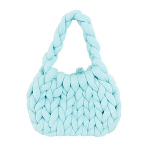 May include: A light blue handbag with a braided handle and body. The bag is made of a soft, woven material, and features a rounded shape with a small clasp closure. The handle is a thick braid, and the bag is a solid, pastel color.