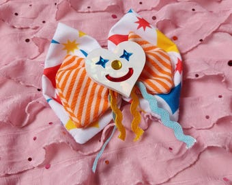 Circus Print Hair Bow with French Style Barrette, Tassels, and Clown Heart Charm