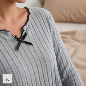 Close‑up of brushed flannel texture showing softness and thickness of the sleepwear fabric.