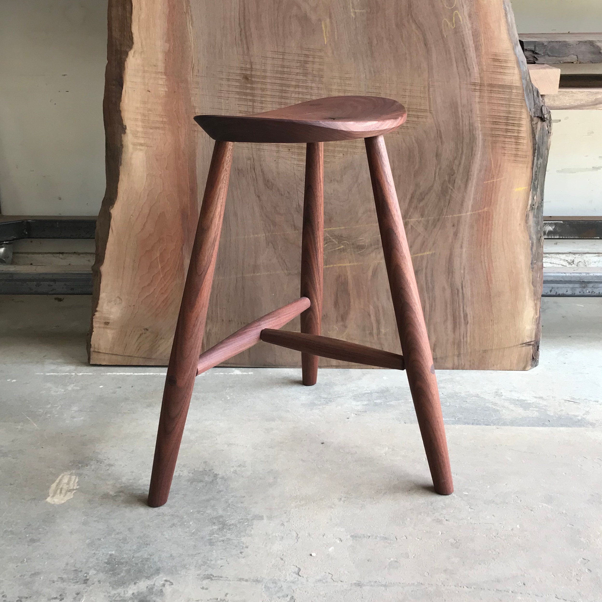 Walnut store saddle stool