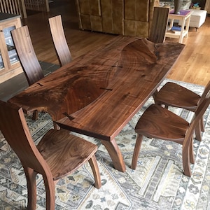 Walnut dining table and chairs